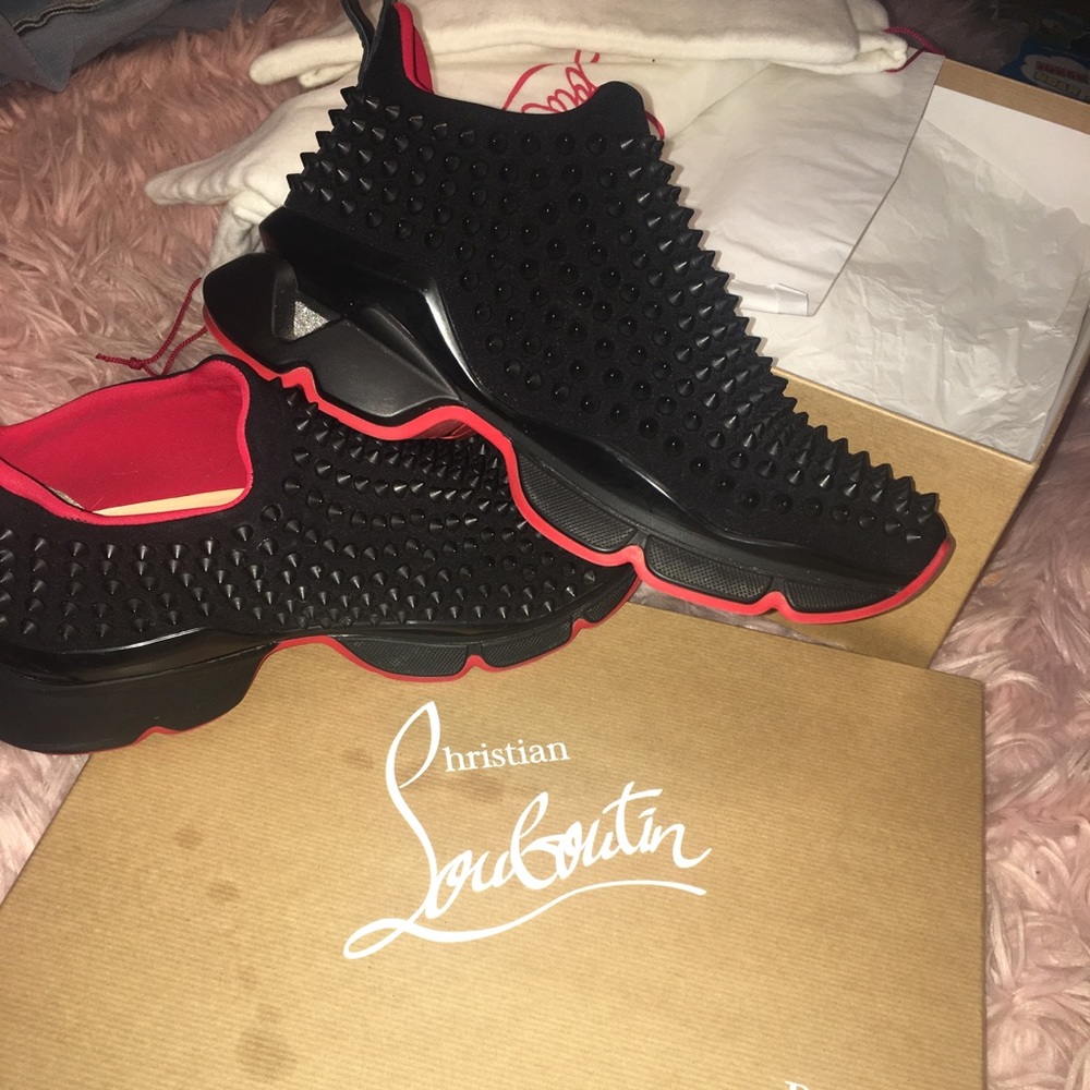 Red bottom spike sneakers